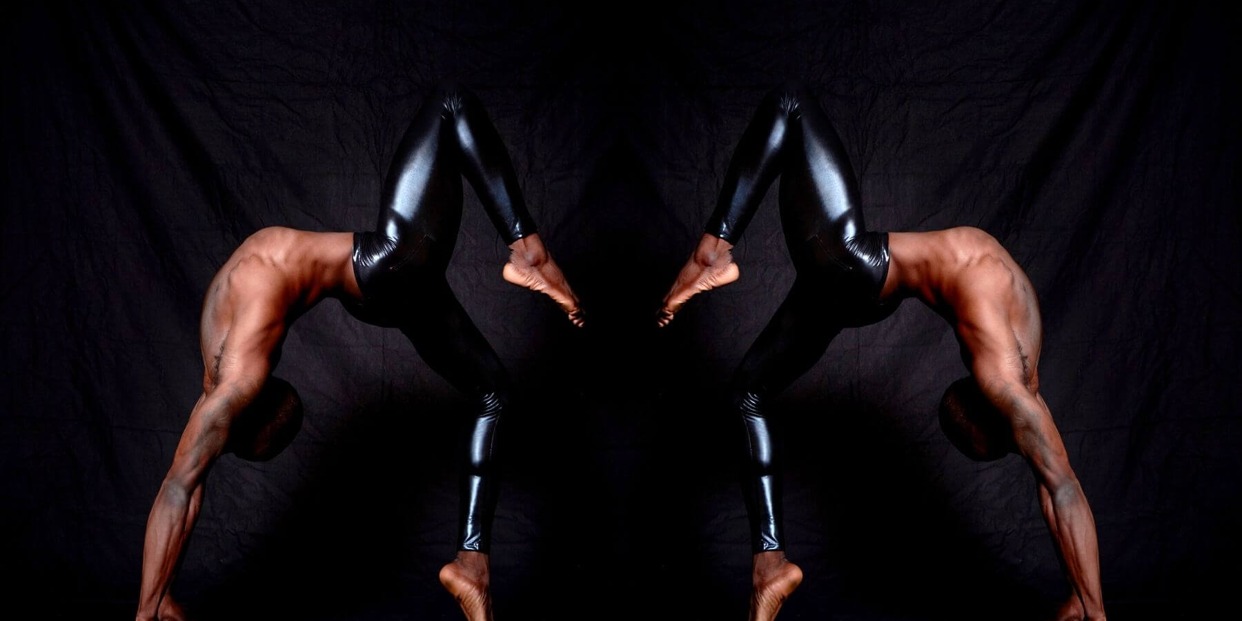 Man Wearing Black Kapow Leggings With Gold Panels